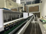 welldone-sanitary-pad-packing-machine-product-transfer-chain-conveyor-closeup