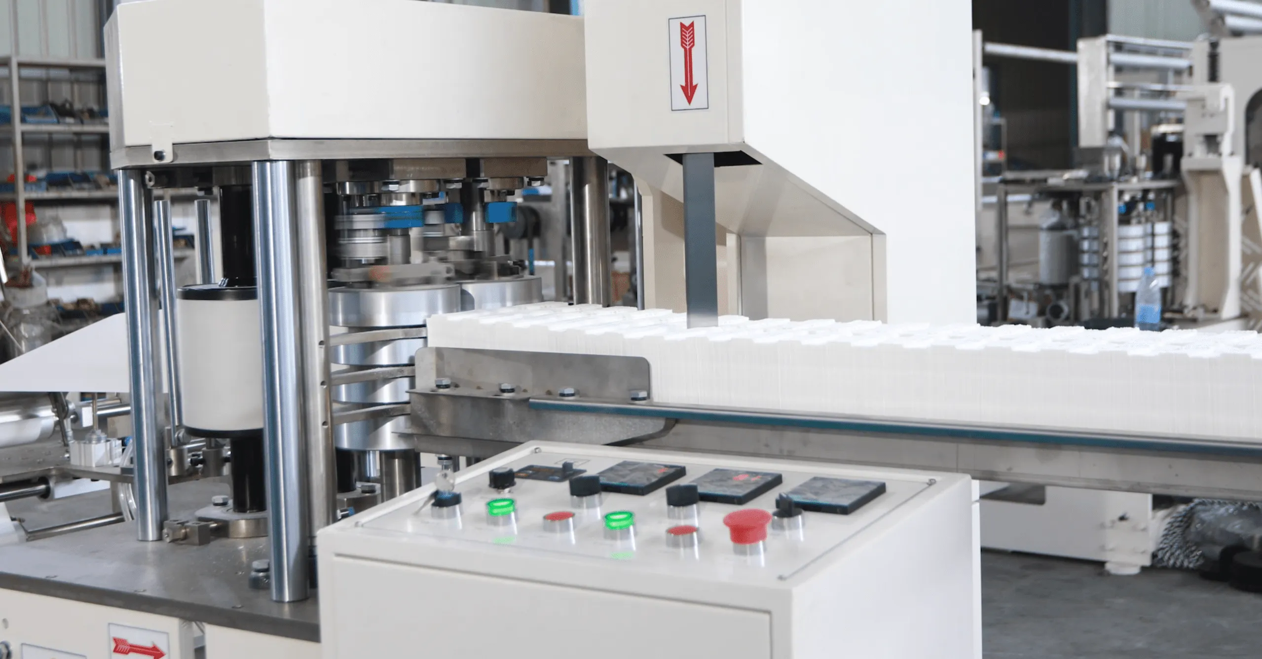 Automated counting and stacking unit for paper tissue products