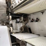 Cutting and Conveying Section of Underpad Machine Welldone Hygiene Machinery