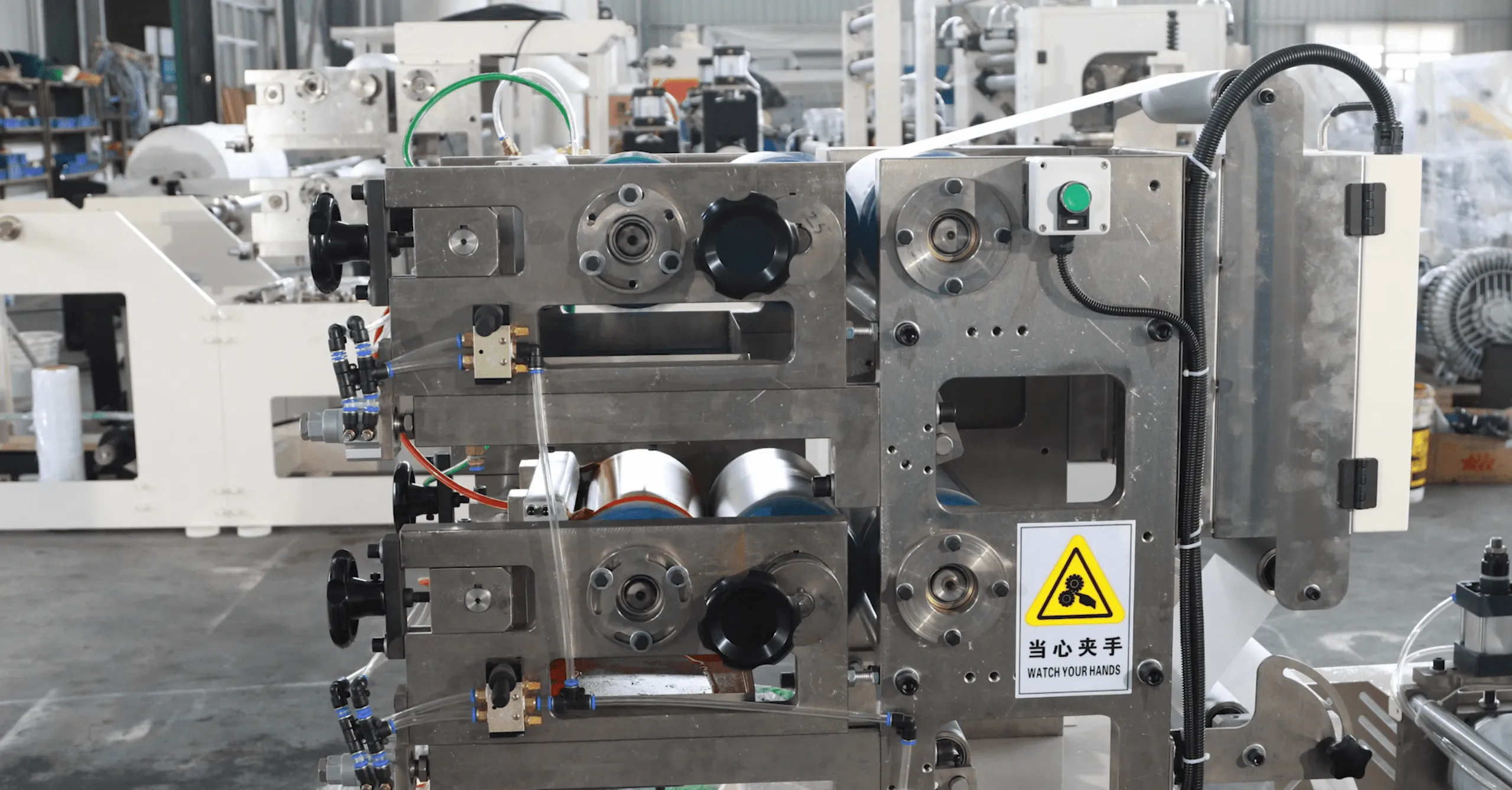 Precision embossing and laminating unit with multi-roller structure