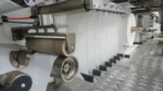 Raw Material Unwinding & Feeding System Welldone Adult Diaper Machine