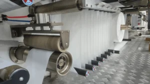 Raw Material Unwinding & Feeding System Welldone Adult Diaper Machine