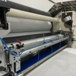welldone-embossing-laminating-section-facial-tissue-machine-closeup