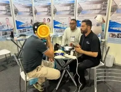 Mostafa providing customer consultation at Egypt hygiene machinery exhibition