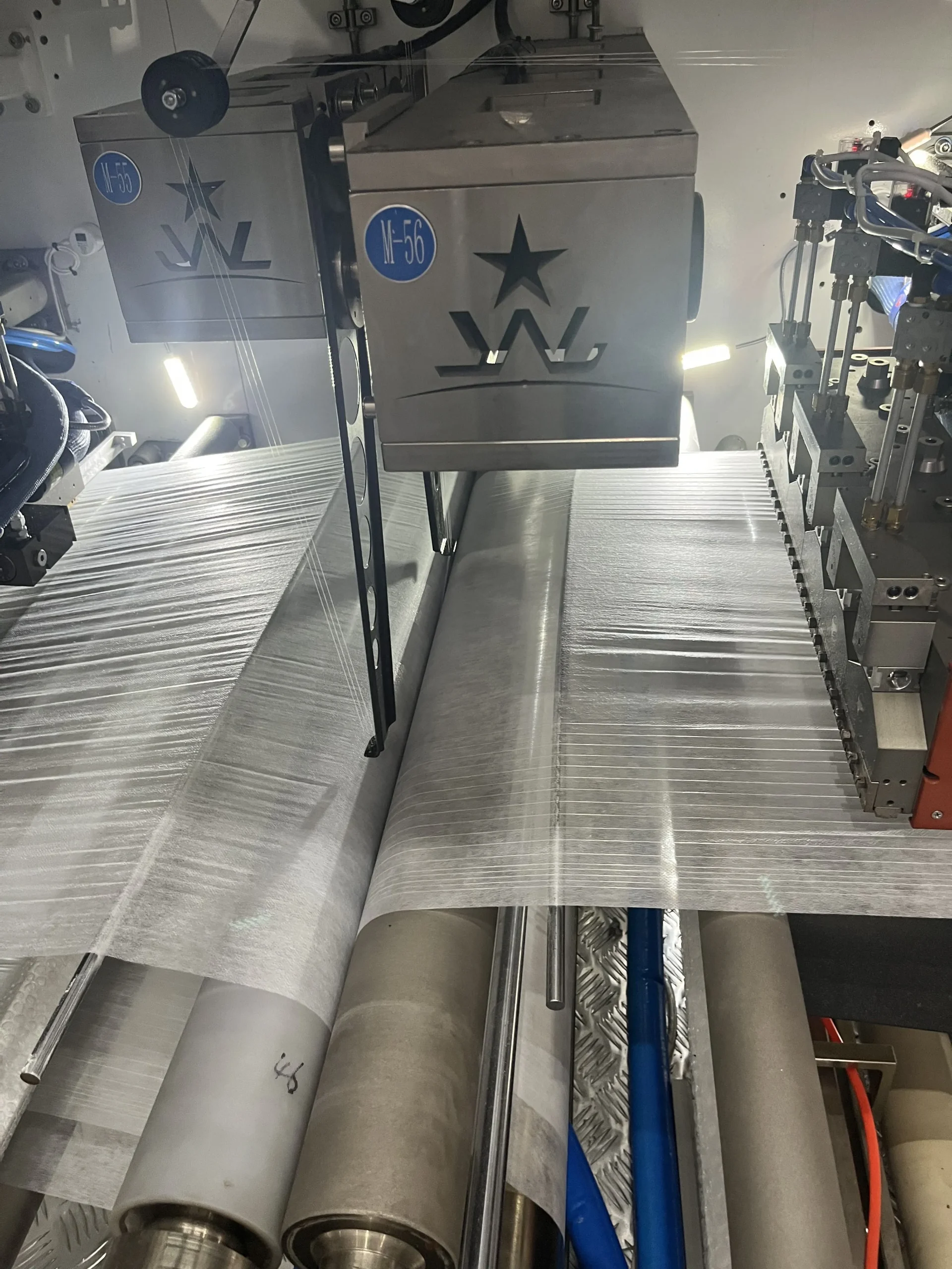 Welldone adult pull up diaper machine outer and inner waistband lamination roller