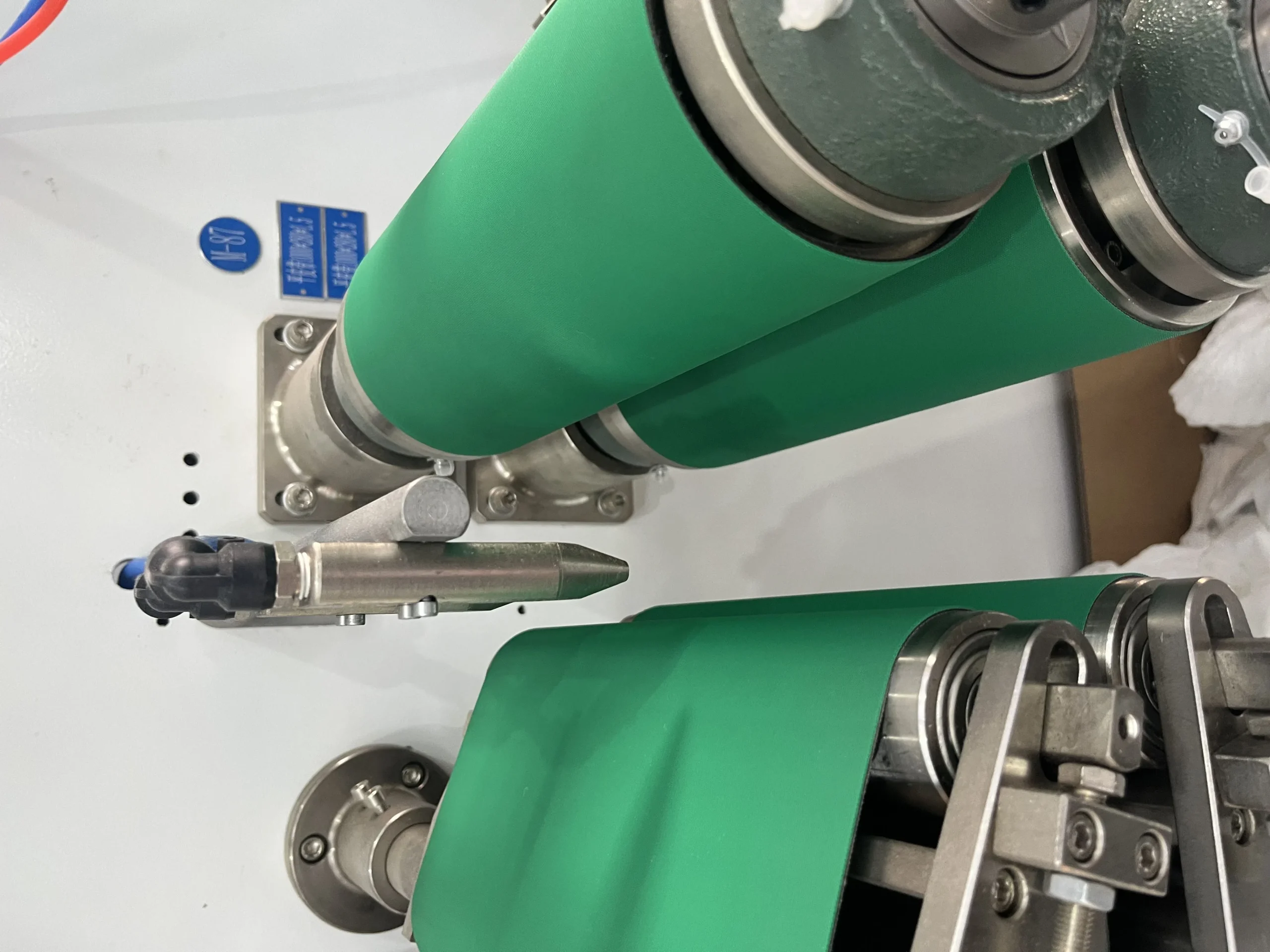 Servo-driven auto-reject nozzle on Welldone adult pull-up production line