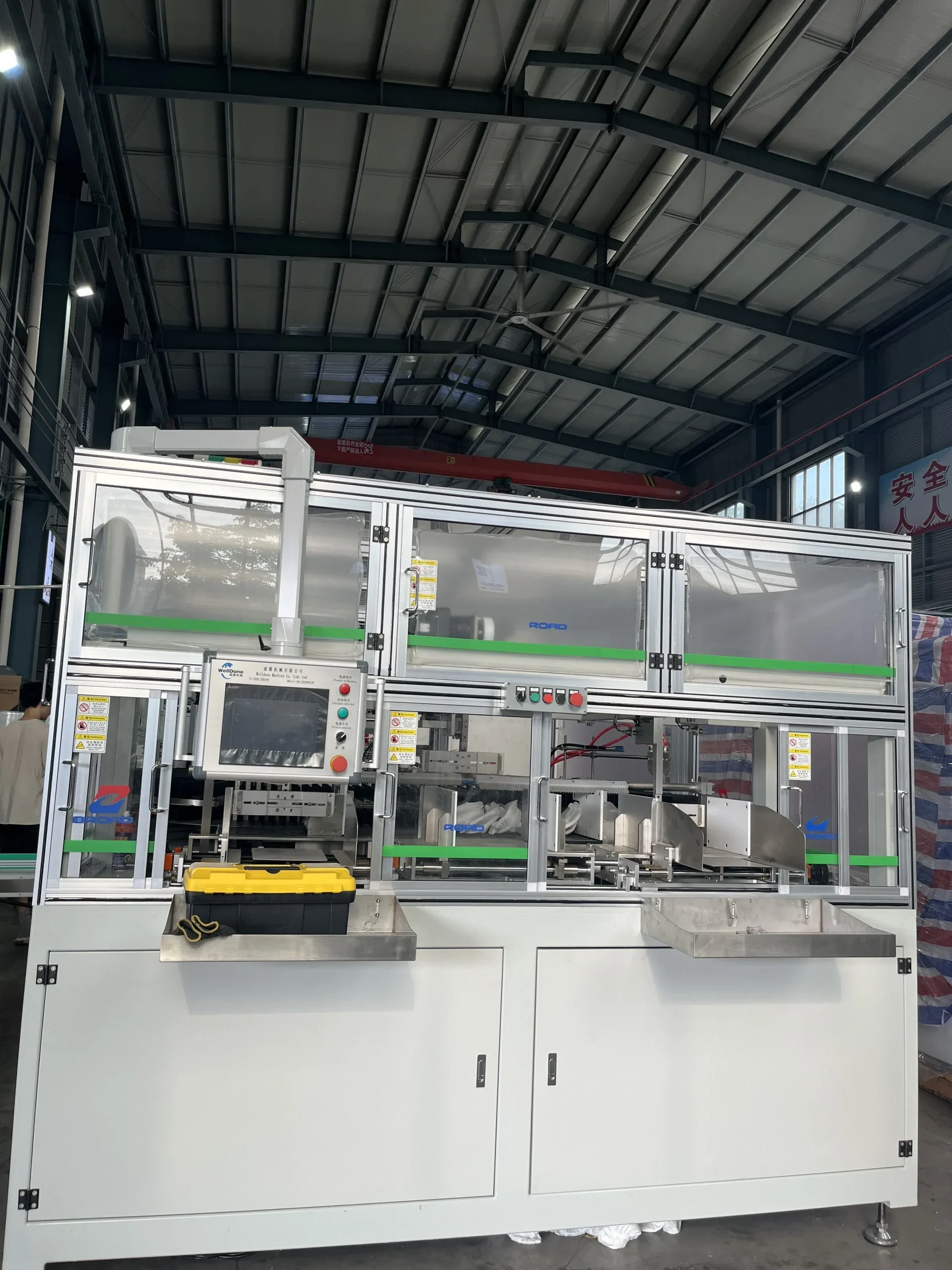 Welldone Machinery adult pull-up integrated stacker with HMI control and servo handshake