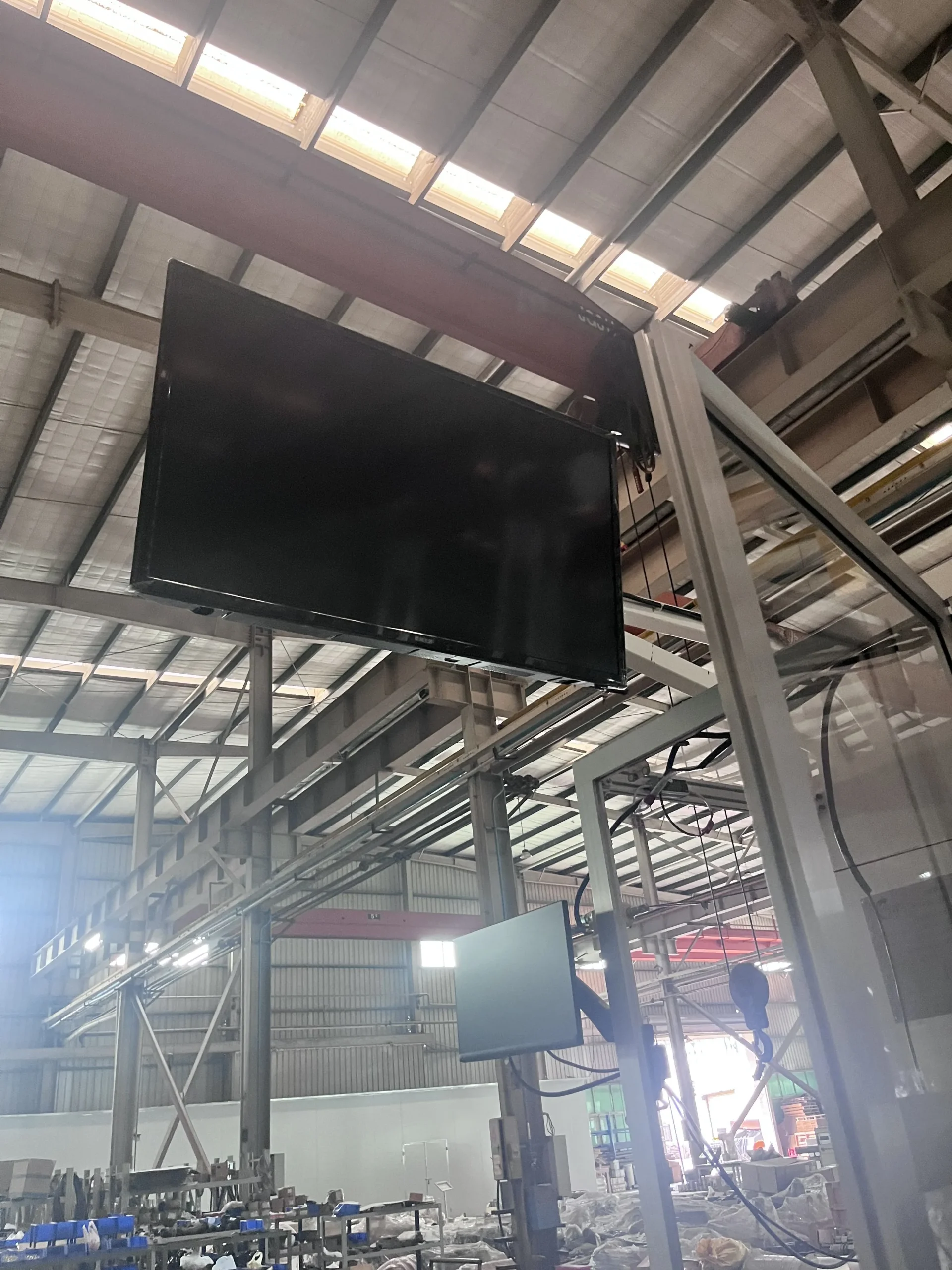Operator control panel on a Welldone sanitary napkin line — 45-minute SKU changeovers on legacy lines cost 60,000+ paid labor hours per year across three shifts and three changeovers per shift