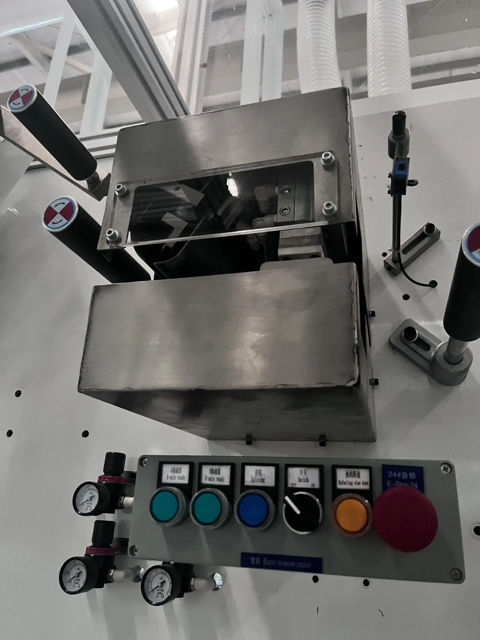 Full-servo HMI operator panel on a Welldone S5 sanitary napkin line — 1,000-piece-per-minute production capacity with recipe-based SKU recall for multi-buyer private-label programs
